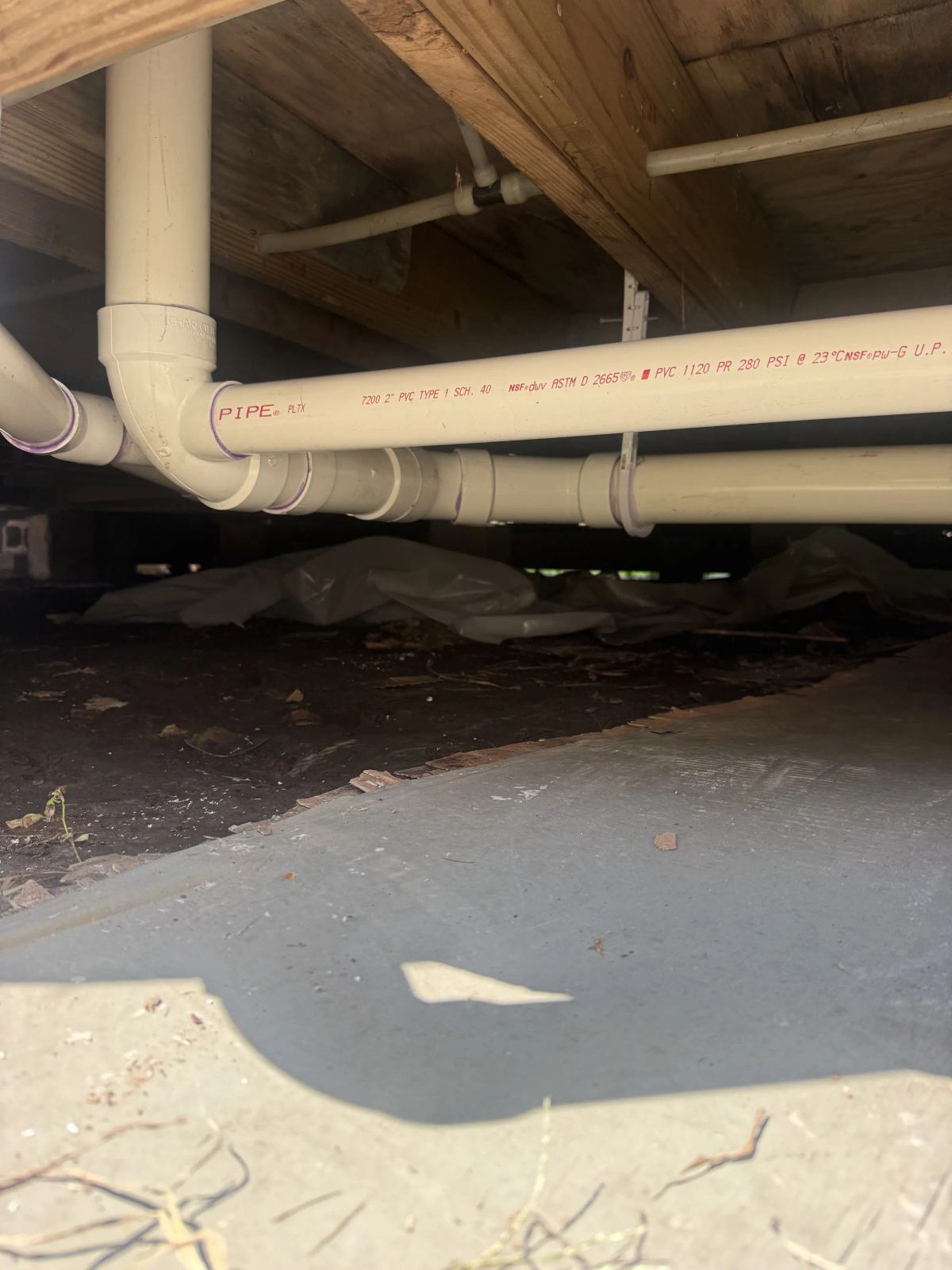 Drain Re-Pipe in a Two-Bath Raised Home in Port Neches