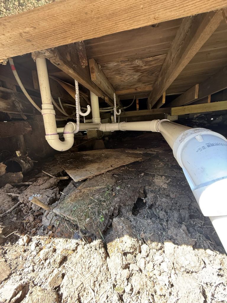 Drain Re-Pipe in a Two-Bath Raised Home in Port Neches — photo 3
