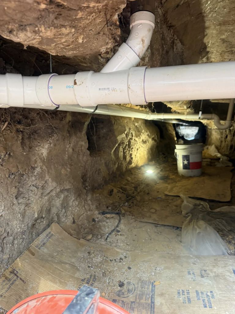 84 Feet of Failing Cast-Iron Drain Line Replaced by Tunneling Under a Beaumont Slab — photo 3
