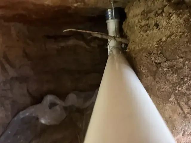 84 Feet of Failing Cast-Iron Drain Line Replaced by Tunneling Under a Beaumont Slab — photo 5
