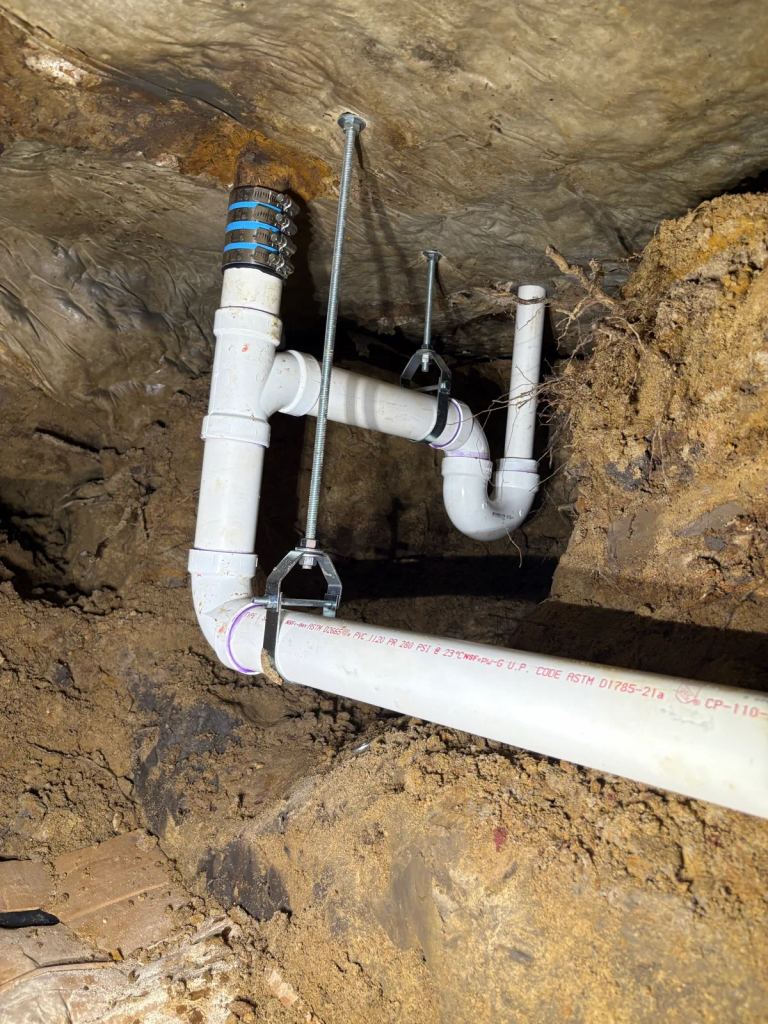 Under-Slab Tunnel Re-Pipe in Groves: New PVC Drain Lines, Floors Left Untouched — photo 2