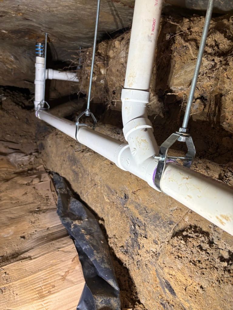Under-Slab Tunnel Re-Pipe in Groves: New PVC Drain Lines, Floors Left Untouched — photo 3